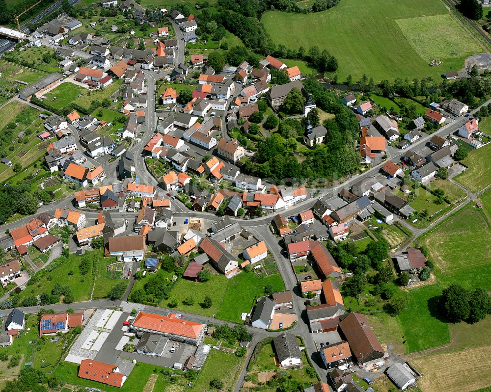 Aerial photograph Burg-Gemünden - Village view on the edge of agricultural fields and land in Burg-Gemünden in the state Hesse, Germany