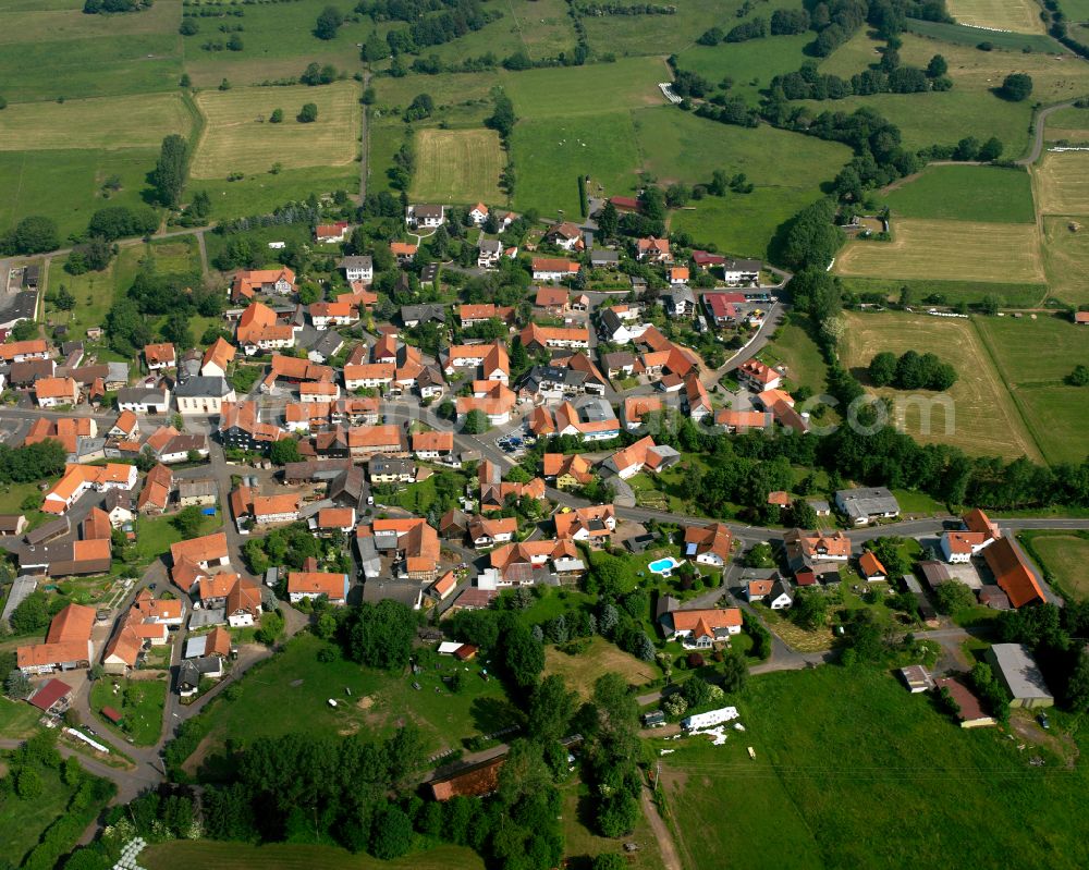 Aerial image Burkhards - Village view on the edge of agricultural fields and land in Burkhards in the state Hesse, Germany