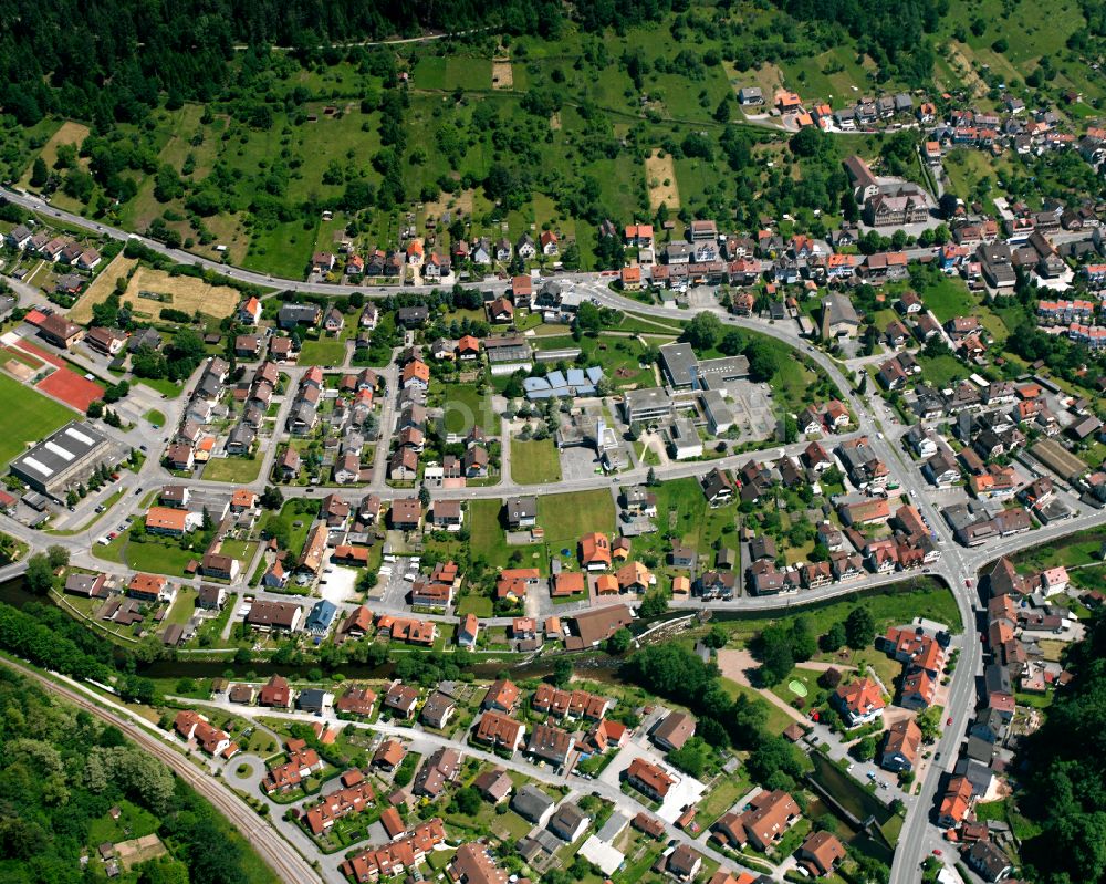 Aerial photograph Calmbach - Village view on the edge of agricultural fields and land in Calmbach in the state Baden-Wuerttemberg, Germany