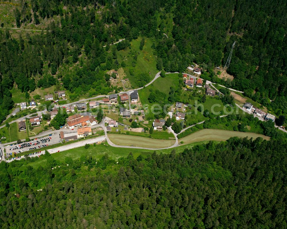 Calmbach from above - Village view on the edge of agricultural fields and land in Calmbach in the state Baden-Wuerttemberg, Germany