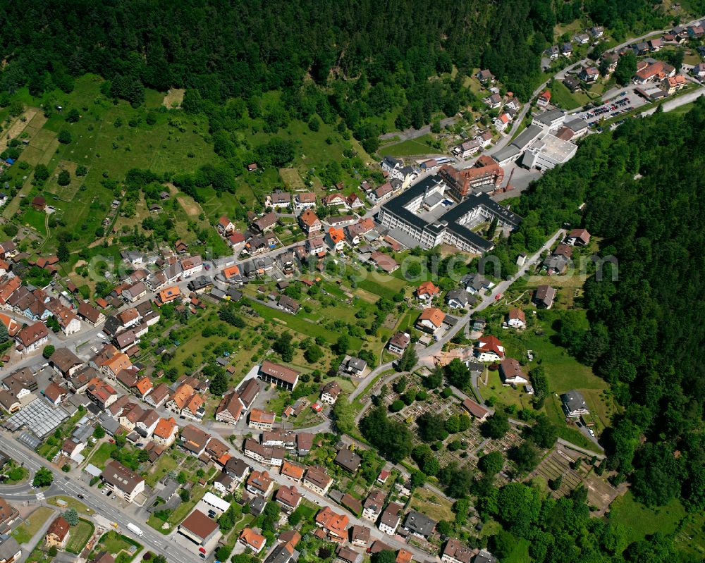 Calmbach from the bird's eye view: Village view on the edge of agricultural fields and land in Calmbach in the state Baden-Wuerttemberg, Germany