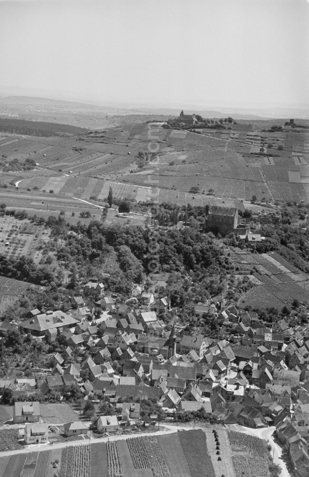 Cleebronn from above - Village view on the edge of agricultural fields and land in Cleebronn in the state Baden-Wuerttemberg, Germany