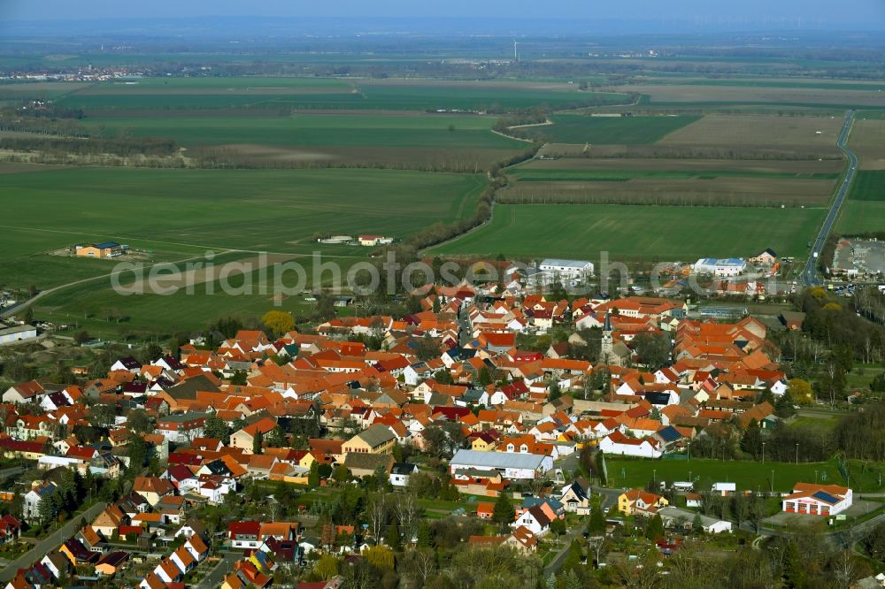 Dachwig from above - Village view on the edge of agricultural fields and land in Dachwig in the state Thuringia, Germany