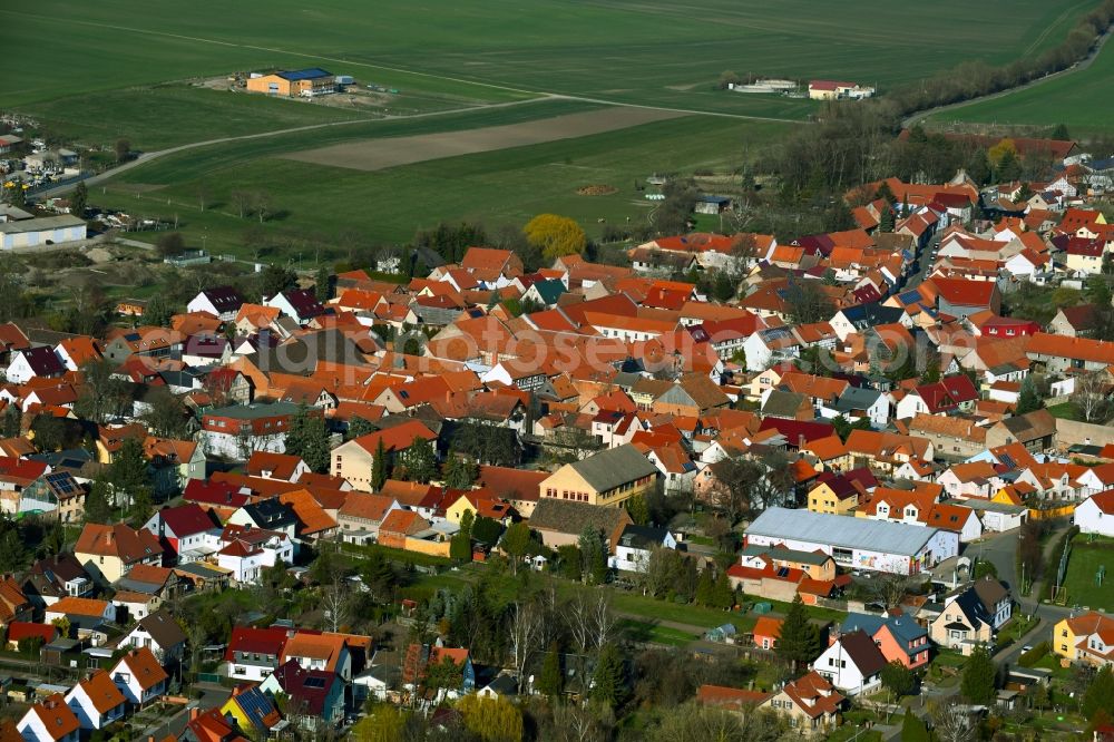 Aerial image Dachwig - Village view on the edge of agricultural fields and land in Dachwig in the state Thuringia, Germany