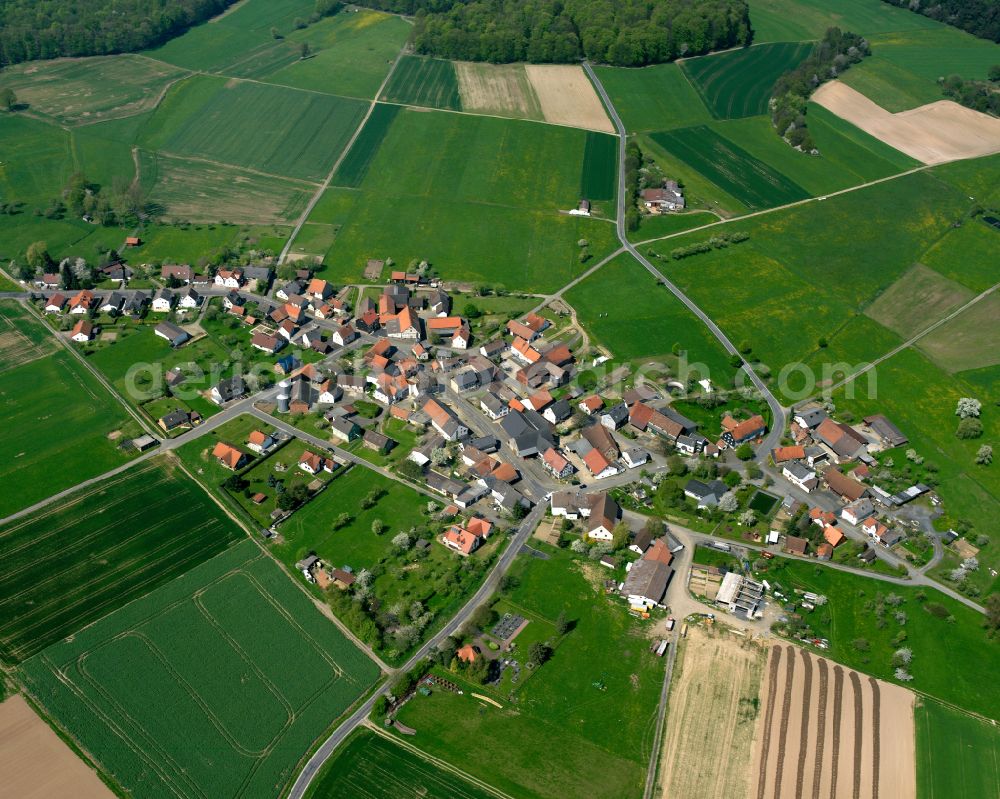 Aerial photograph Dannenrod - Village view on the edge of agricultural fields and land in Dannenrod in the state Hesse, Germany