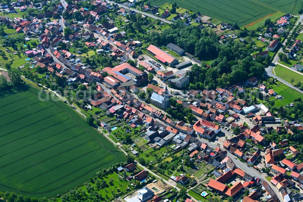 Dardesheim from above - Village view on the edge of agricultural fields and land in Dardesheim in the state Saxony-Anhalt, Germany