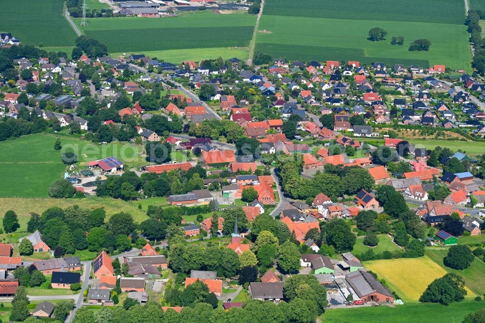 Aerial image Debstedt - Village view on the edge of agricultural fields and land in Debstedt in the state Lower Saxony, Germany