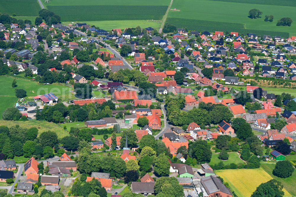 Aerial photograph Debstedt - Village view on the edge of agricultural fields and land in Debstedt in the state Lower Saxony, Germany