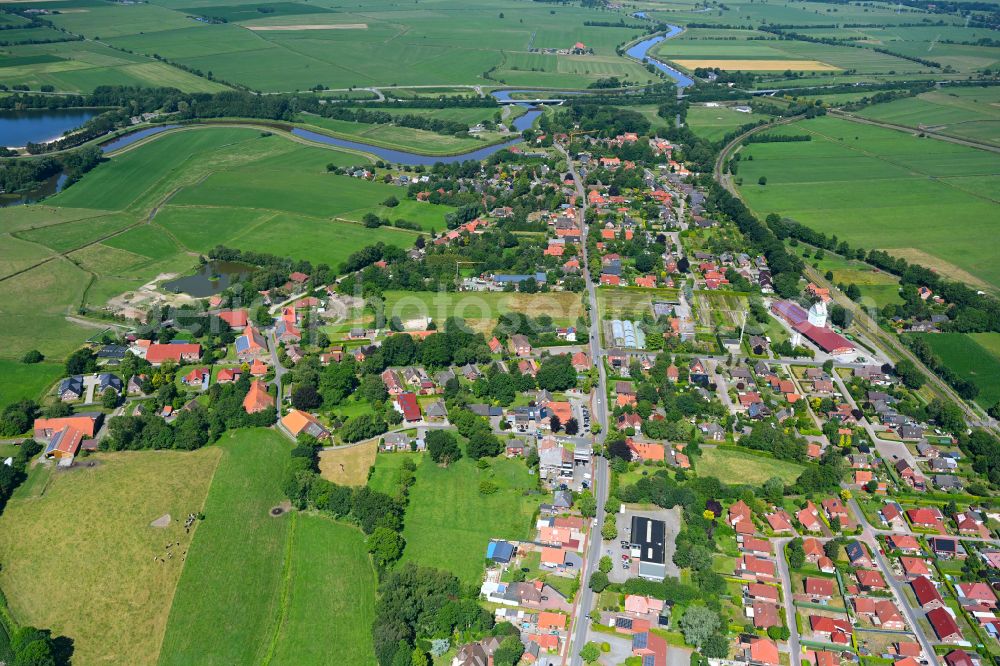 Detern from above - Village view on the edge of agricultural fields and land in Detern in the state Lower Saxony, Germany