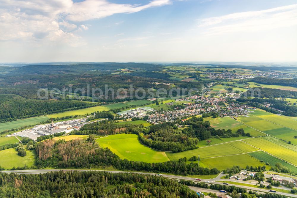 Aerial image Diemelstadt - Village view on the edge of agricultural fields and land in Diemelstadt in the state Hesse, Germany