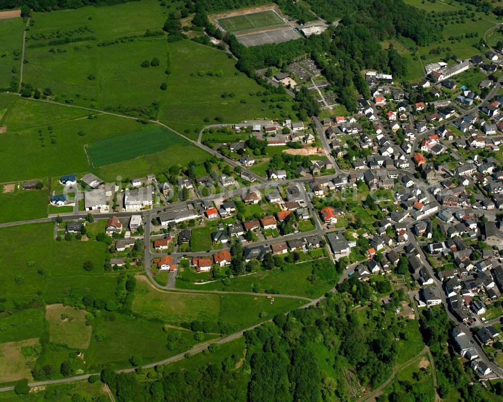 Dorndorf from the bird's eye view: Village view on the edge of agricultural fields and land in Dorndorf in the state Hesse, Germany