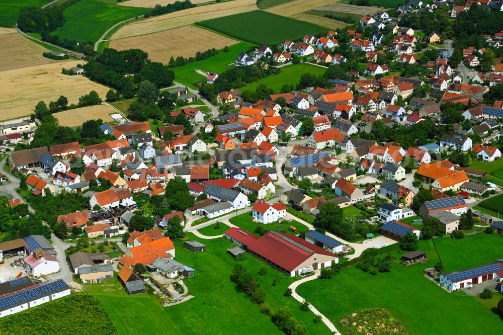 Ehingen am Ries from the bird's eye view: Village view on the edge of agricultural fields and land on street Hauptstrasse in Ehingen am Ries in the state Bavaria, Germany