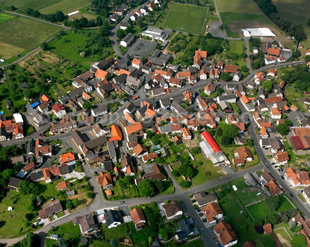 Aerial photograph Eichelsachsen - Village view on the edge of agricultural fields and land in Eichelsachsen in the state Hesse, Germany