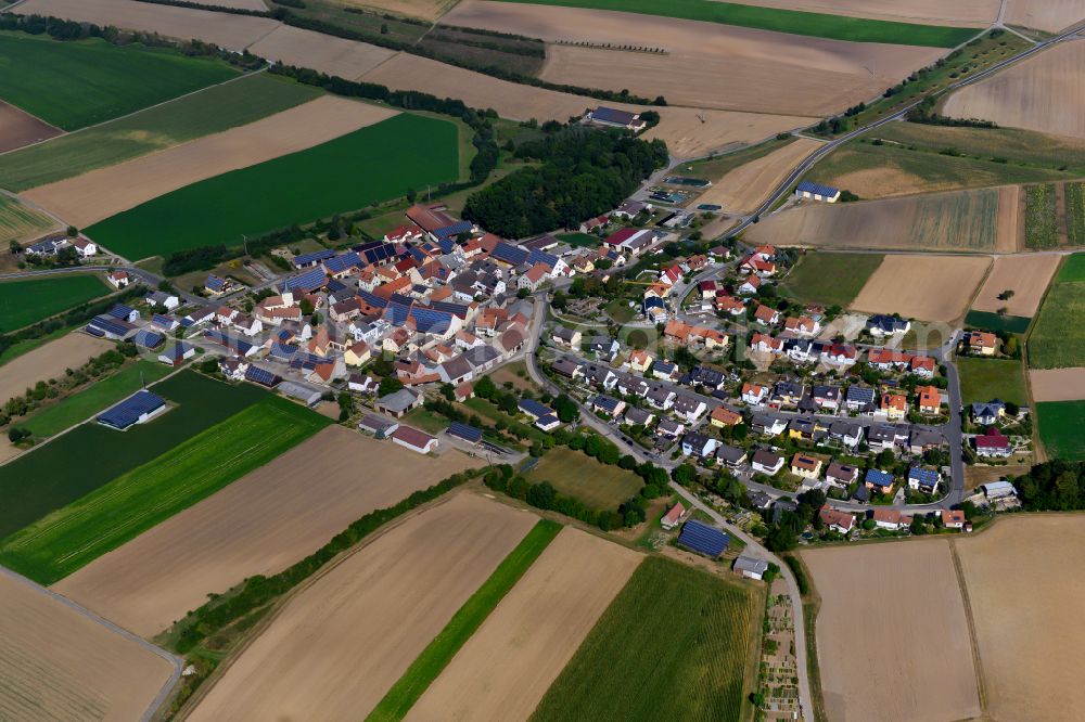 Eichelsee from the bird's eye view: Village view on the edge of agricultural fields and land in Eichelsee in the state Bavaria, Germany