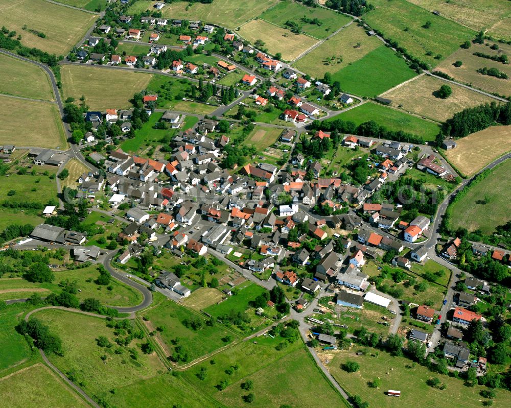 Aerial photograph Einartshausen - Village view on the edge of agricultural fields and land in Einartshausen in the state Hesse, Germany