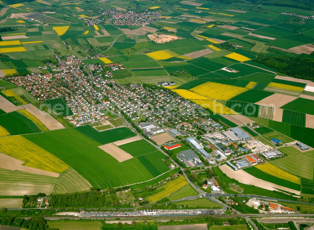 Einsingen from the bird's eye view: Village view on the edge of agricultural fields and land in Einsingen in the state Baden-Wuerttemberg, Germany