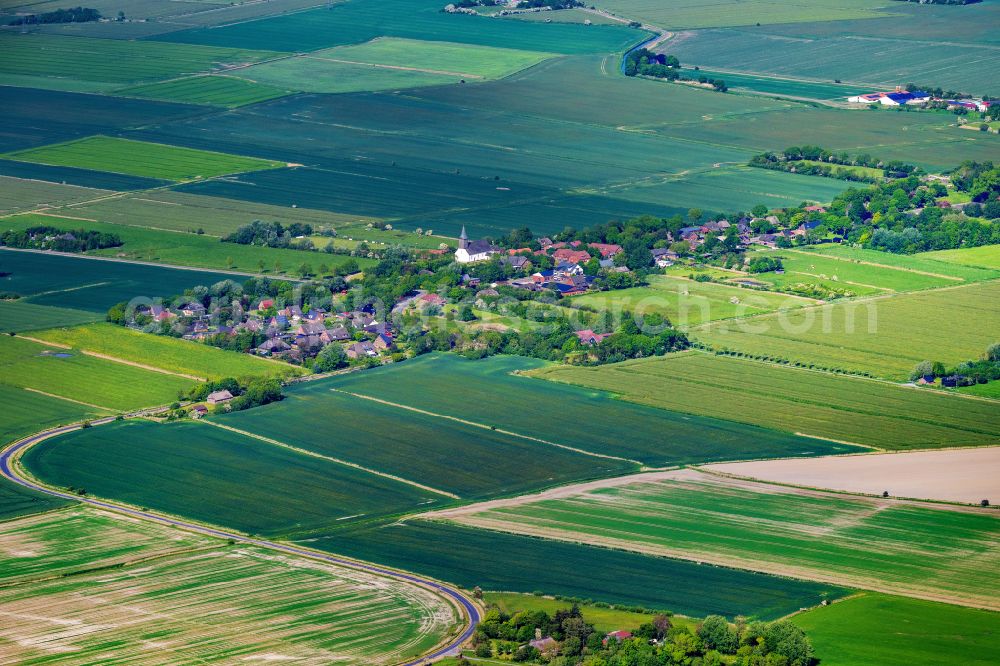 Aerial image Emmelsbüll - Village view on the edge of agricultural fields and land on street Dorfstrasse in Emmelsbuell in the state Schleswig-Holstein, Germany