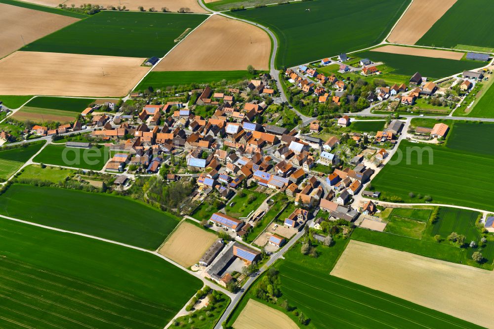 Enheim from the bird's eye view: Village view on the edge of agricultural fields and land in Enheim in the state Bavaria, Germany