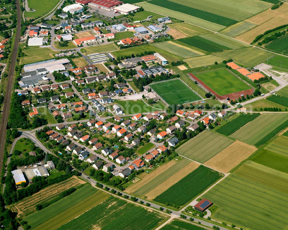 Ergenzingen from the bird's eye view: Village view on the edge of agricultural fields and land in Ergenzingen in the state Baden-Wuerttemberg, Germany