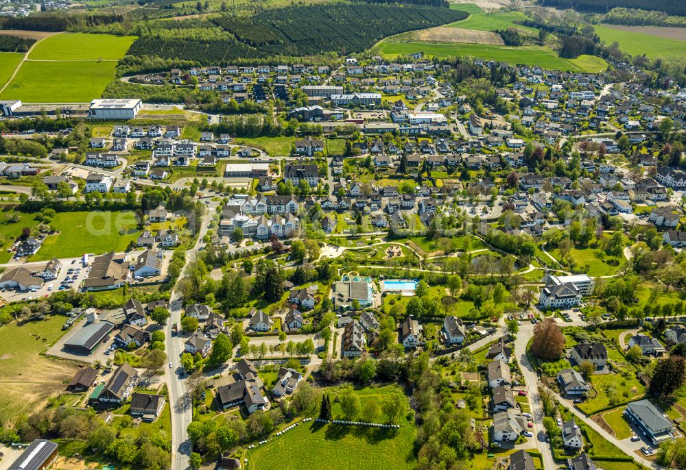 Eslohe (Sauerland) from above - Village view on the edge of agricultural fields and land in Eslohe (Sauerland) in the state North Rhine-Westphalia, Germany