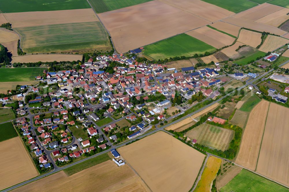 Eßfeld from above - Village view on the edge of agricultural fields and land in Eßfeld in the state Bavaria, Germany