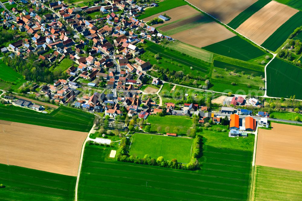 Euerfeld from the bird's eye view: Village view on the edge of agricultural fields and land in Euerfeld in the state Bavaria, Germany