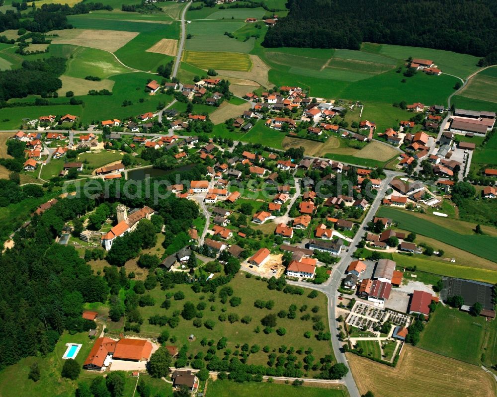 Falkenfels from the bird's eye view: Village view on the edge of agricultural fields and land in Falkenfels in the state Bavaria, Germany