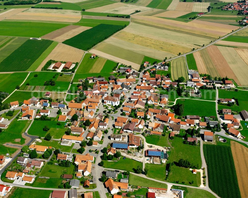 Feldhausen from the bird's eye view: Village view on the edge of agricultural fields and land in Feldhausen in the state Baden-Wuerttemberg, Germany