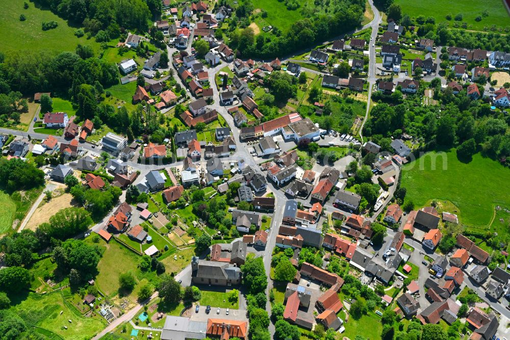 Feldkahl from the bird's eye view: Village view on the edge of agricultural fields and land in Feldkahl in the state Bavaria, Germany