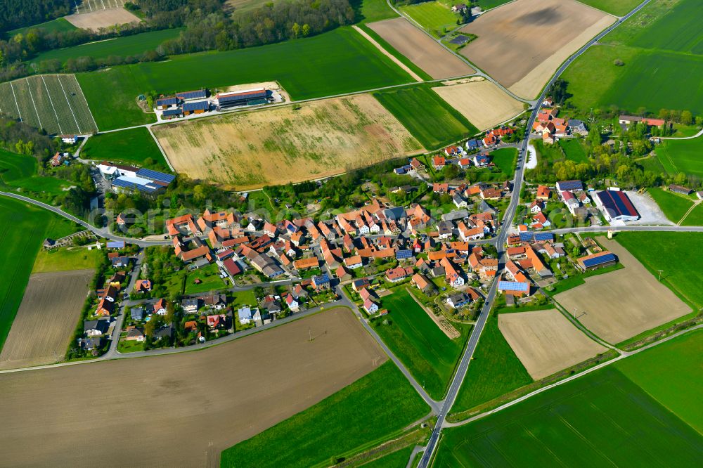 Aerial image Feuerbach - Village view on the edge of agricultural fields and land in Feuerbach in the state Bavaria, Germany