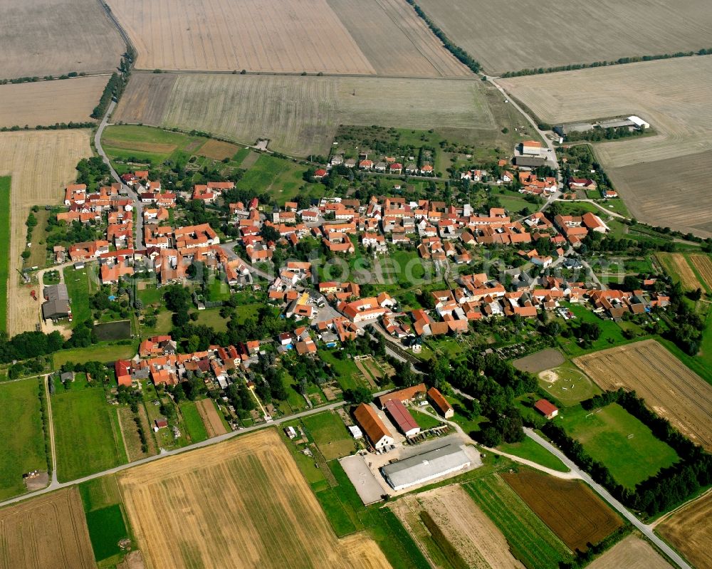 Flarchheim from above - Village view on the edge of agricultural fields and land in Flarchheim in the state Thuringia, Germany