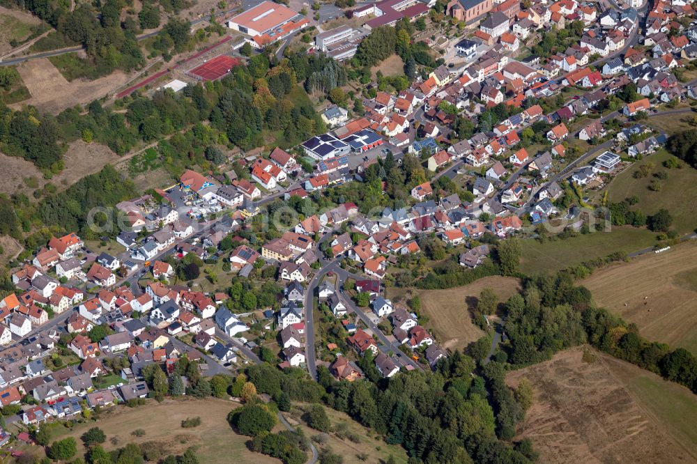 Aerial image Frammersbach - Village view on the edge of agricultural fields and land in Frammersbach in the state Bavaria, Germany