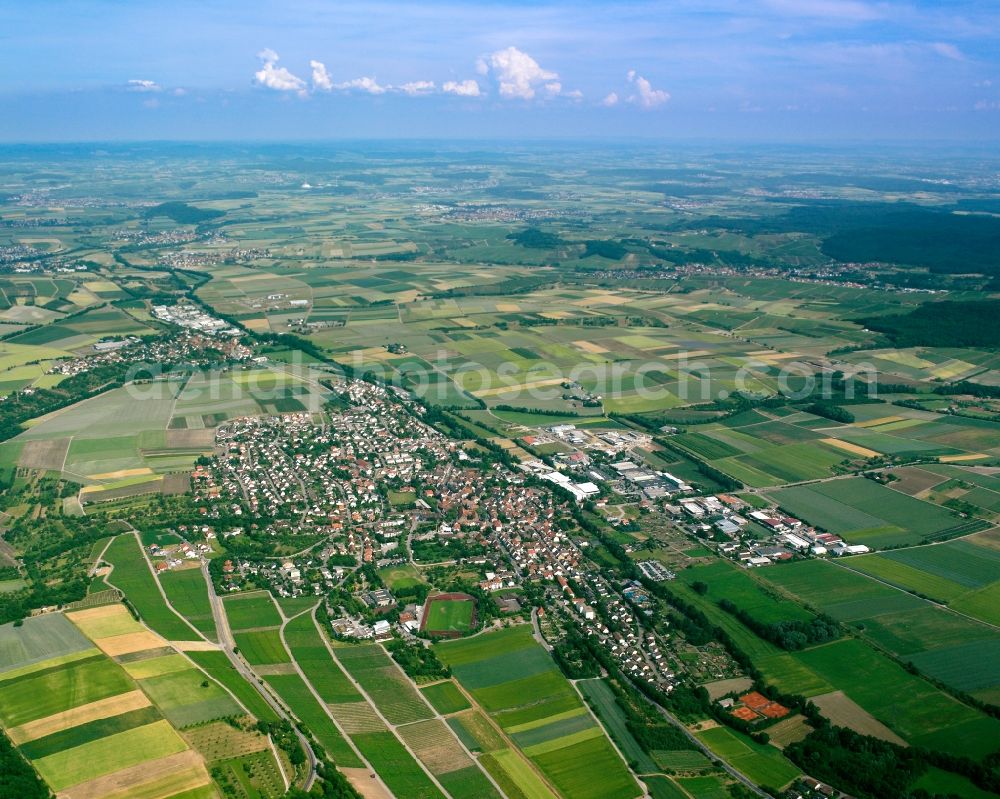 Aerial photograph Frauenzimmern - Village view on the edge of agricultural fields and land in Frauenzimmern in the state Baden-Wuerttemberg, Germany