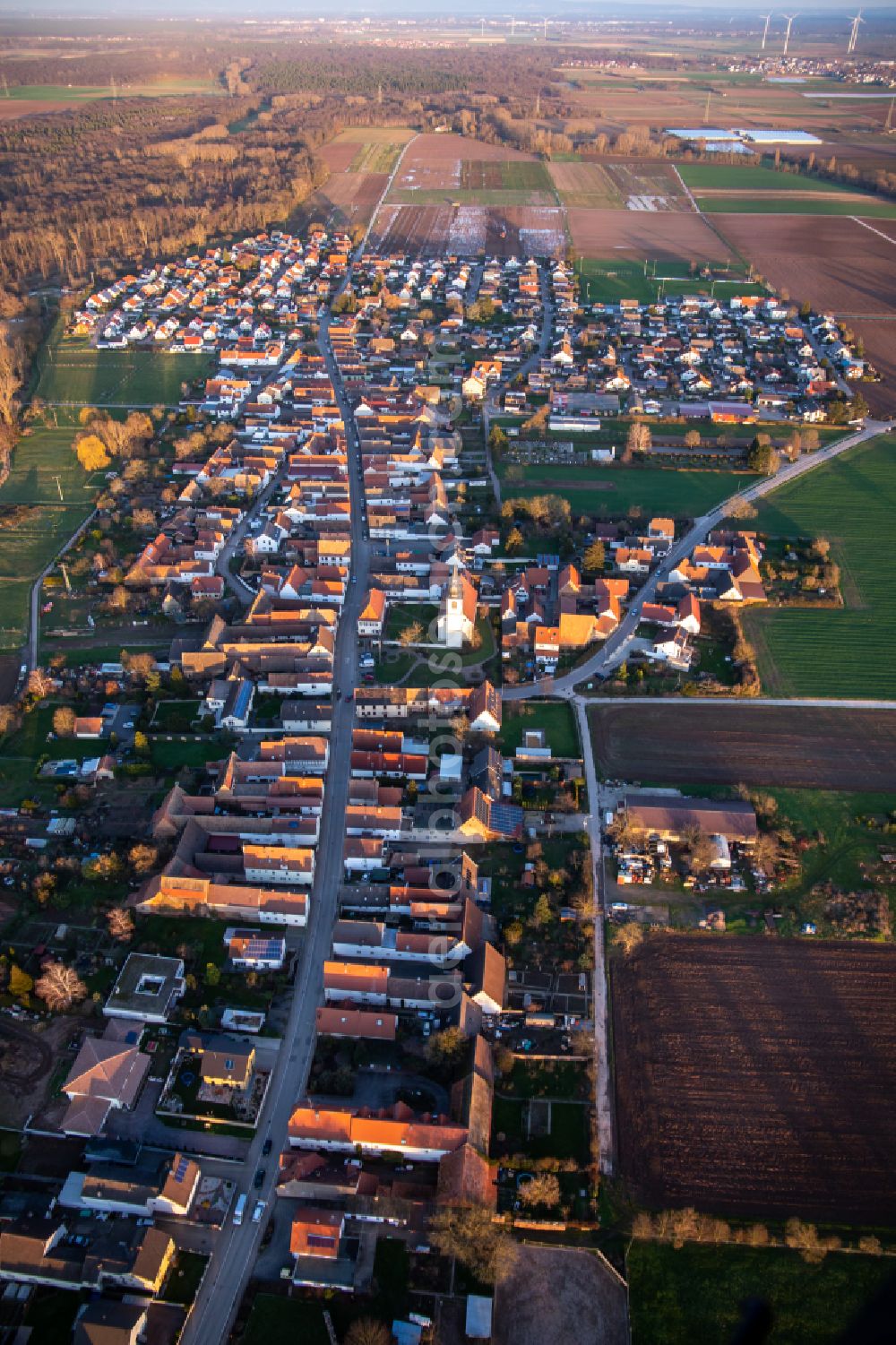 Aerial image Freisbach - Village view on the edge of agricultural fields and land on street Hauptstrasse in Freisbach in the state Rhineland-Palatinate, Germany