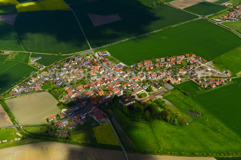 Fröhstockheim from above - Village view on the edge of agricultural fields and land in Fröhstockheim in the state Bavaria, Germany