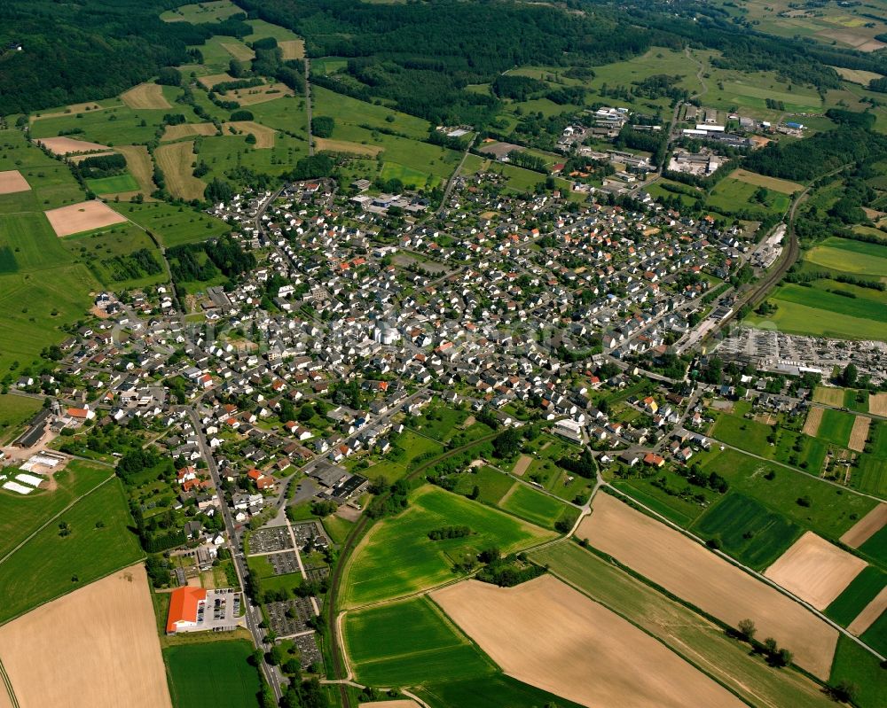 Aerial image Frickhofen - Village view on the edge of agricultural fields and land in Frickhofen in the state Hesse, Germany