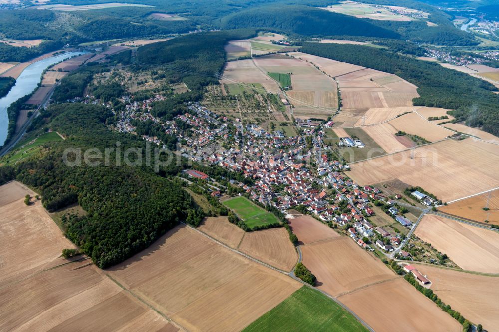 Aerial image Gambach - Village view on the edge of agricultural fields and land in Gambach in the state Bavaria, Germany