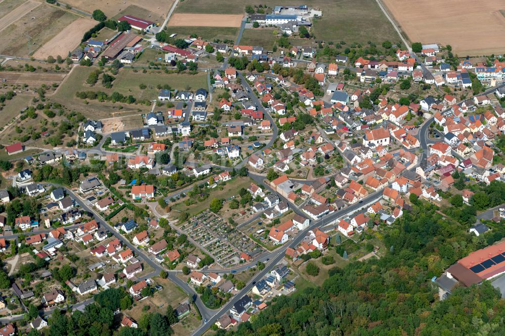 Aerial image Gambach - Village view on the edge of agricultural fields and land in Gambach in the state Bavaria, Germany