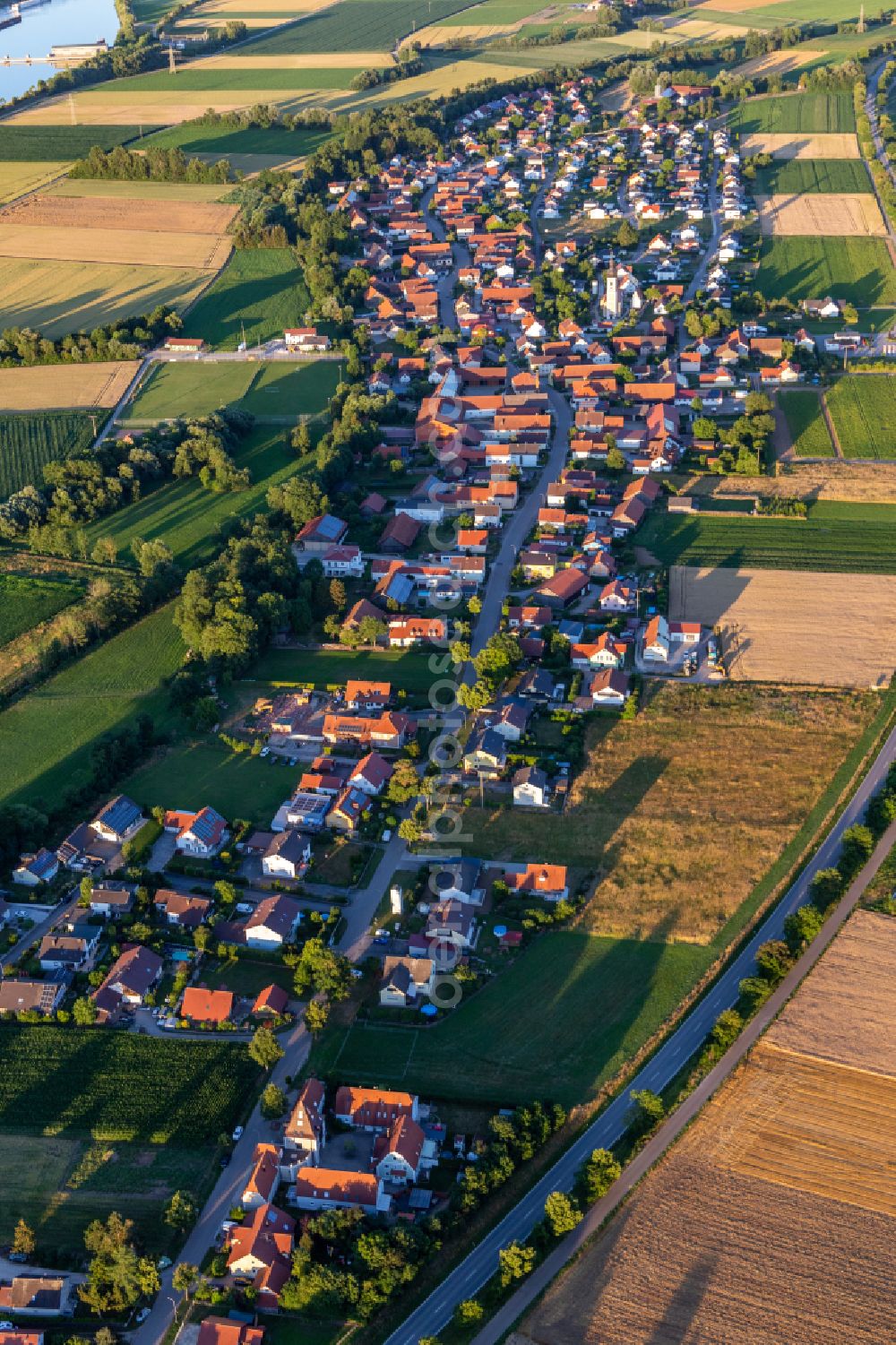 Geisling from the bird's eye view: Village view on the edge of agricultural fields and land in Geisling in the state Bavaria, Germany