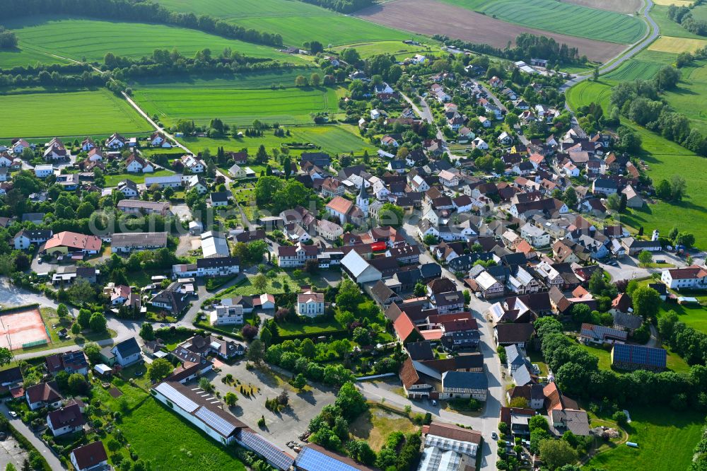 Gemünda i.OFr. from the bird's eye view: Village view on the edge of agricultural fields and land in Gemünda i.OFr. in the state Bavaria, Germany