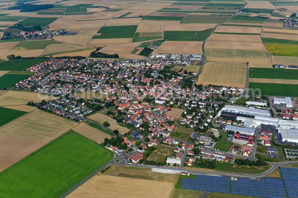 Aerial photograph Giebelstadt - Village view on the edge of agricultural fields and land in Giebelstadt in the state Bavaria, Germany