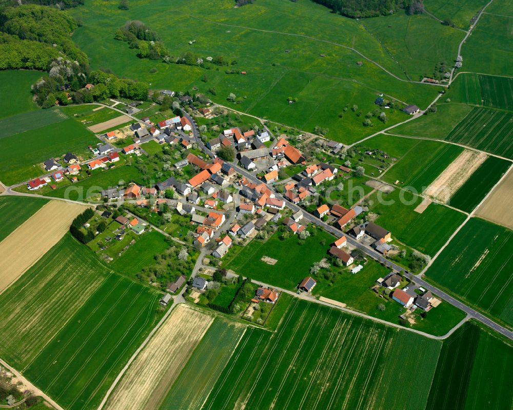 Gleimenhain from above - Village view on the edge of agricultural fields and land in Gleimenhain in the state Hesse, Germany