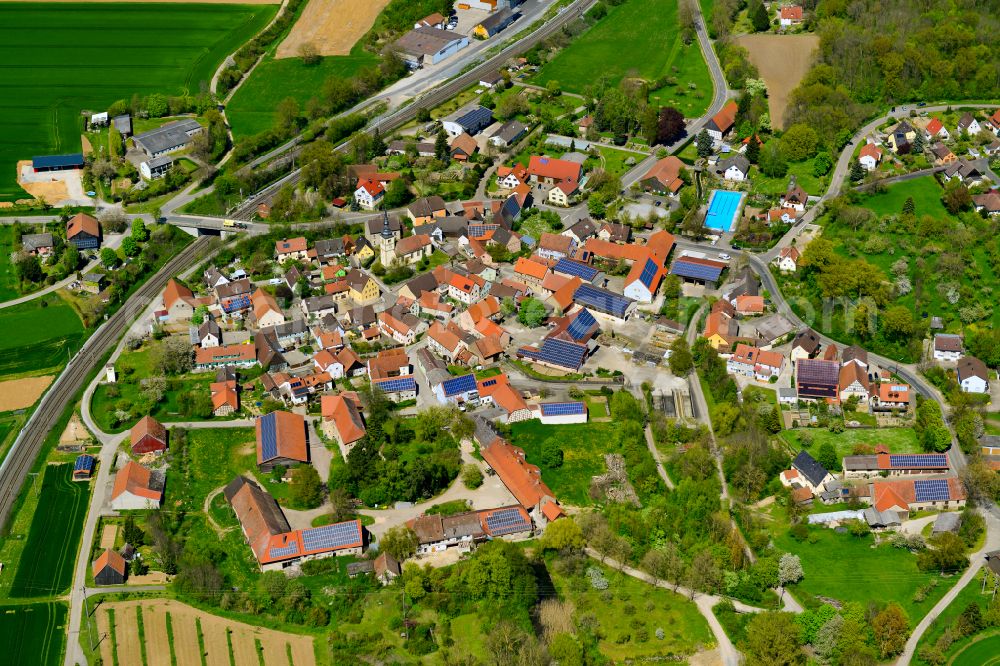 Aerial image Gnötzheim - Village view on the edge of agricultural fields and land in Gnötzheim in the state Bavaria, Germany