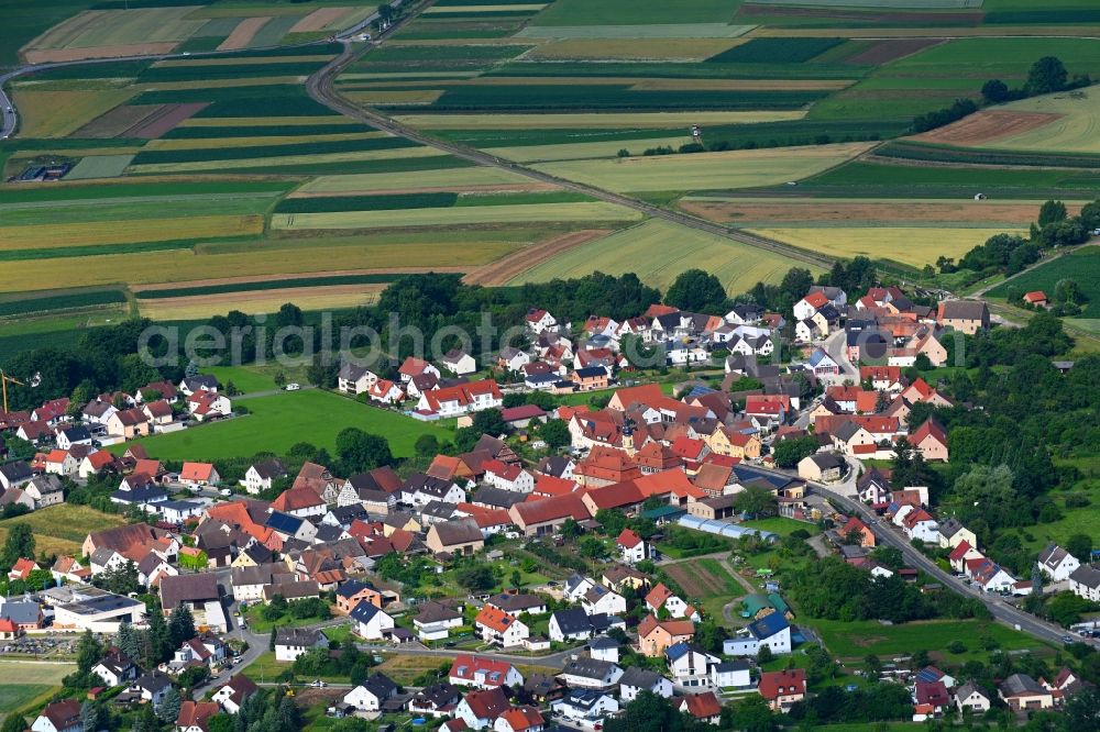 Gosberg from above - Village view on the edge of agricultural fields and land in Gosberg in the state Bavaria, Germany