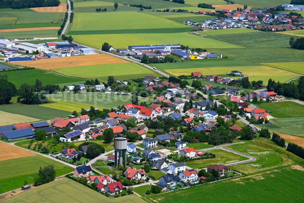 Grampersdorf from above - Village view on the edge of agricultural fields and land in Grampersdorf in the state Bavaria, Germany