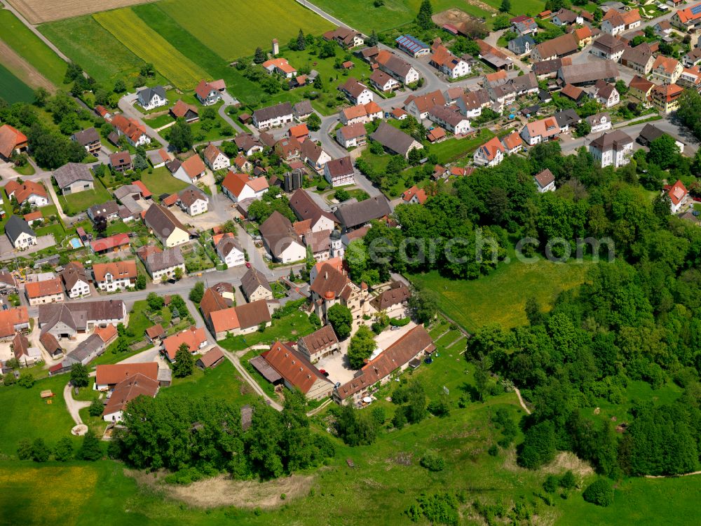 Aerial image Grüningen - Village view on the edge of agricultural fields and land in Grüningen in the state Baden-Wuerttemberg, Germany