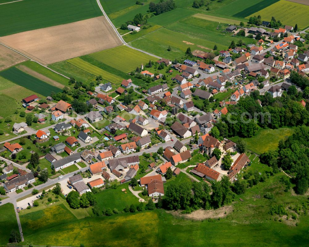 Aerial photograph Grüningen - Village view on the edge of agricultural fields and land in Grüningen in the state Baden-Wuerttemberg, Germany