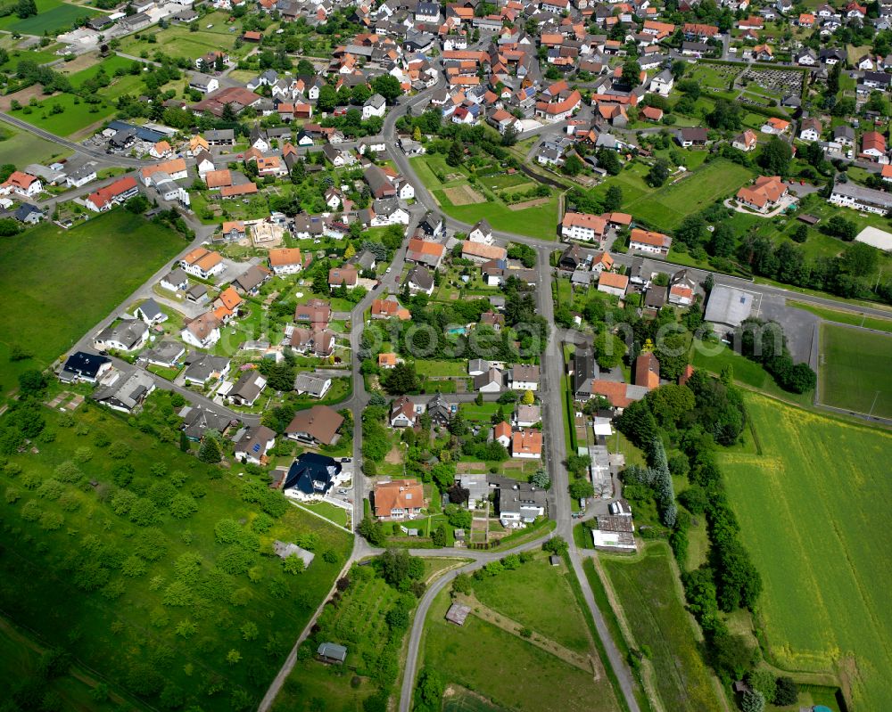 Aerial image Groß Eichen - Village view on the edge of agricultural fields and land in Groß Eichen in the state Hesse, Germany