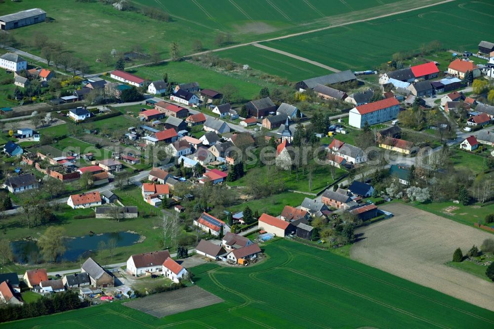 Groß Pinnow from above - Village view on the edge of agricultural fields and land in Gross Pinnow in the state Brandenburg, Germany