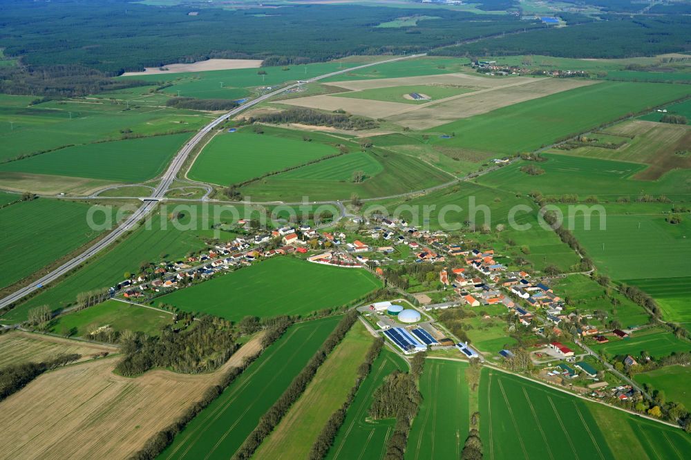 Groß Warnow from above - Village view on the edge of agricultural fields and land in Gross Warnow in the state Brandenburg, Germany